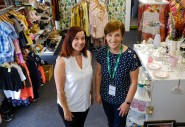 Shop volunteers smiling at the camera